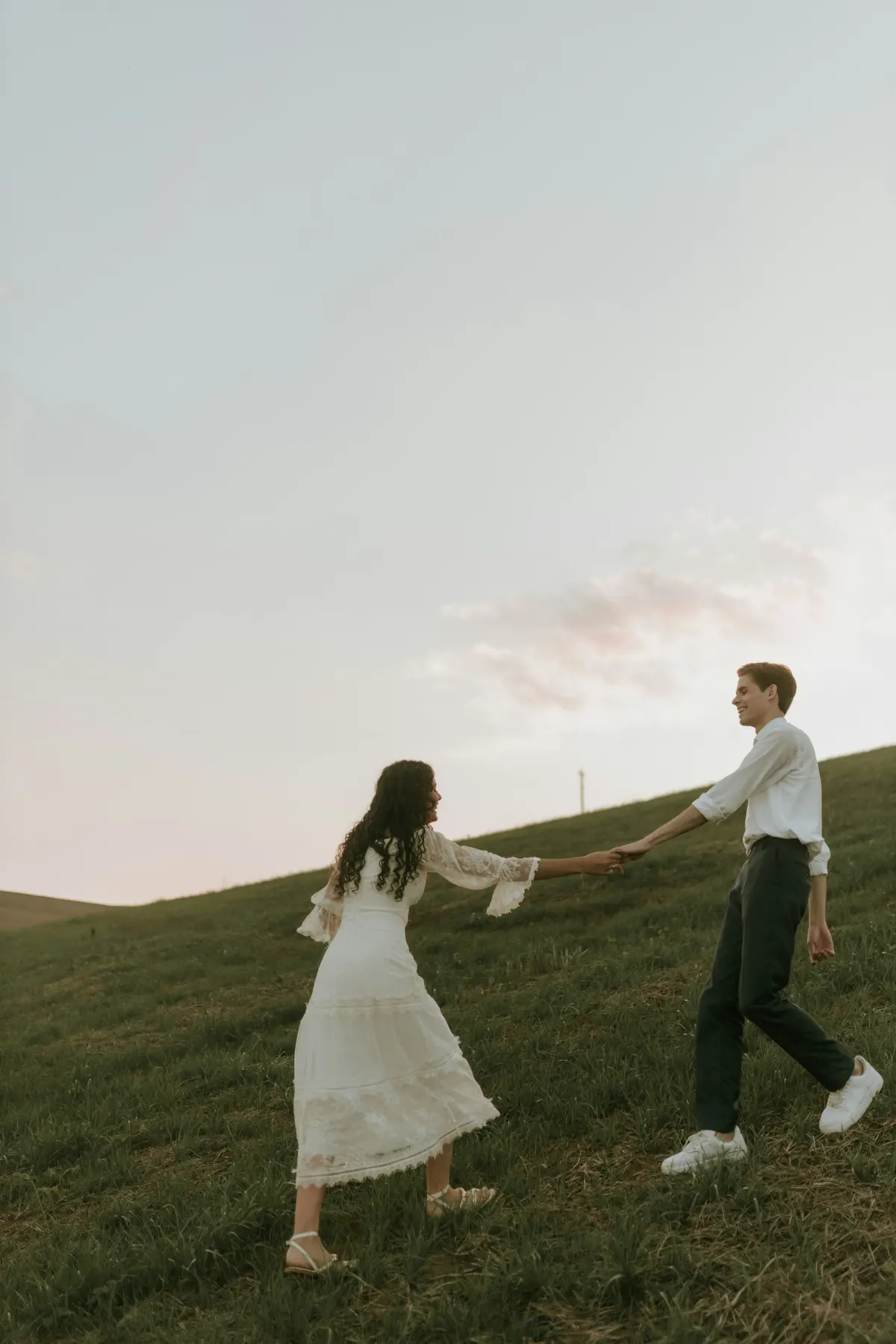 Hand in hand under the evening sky