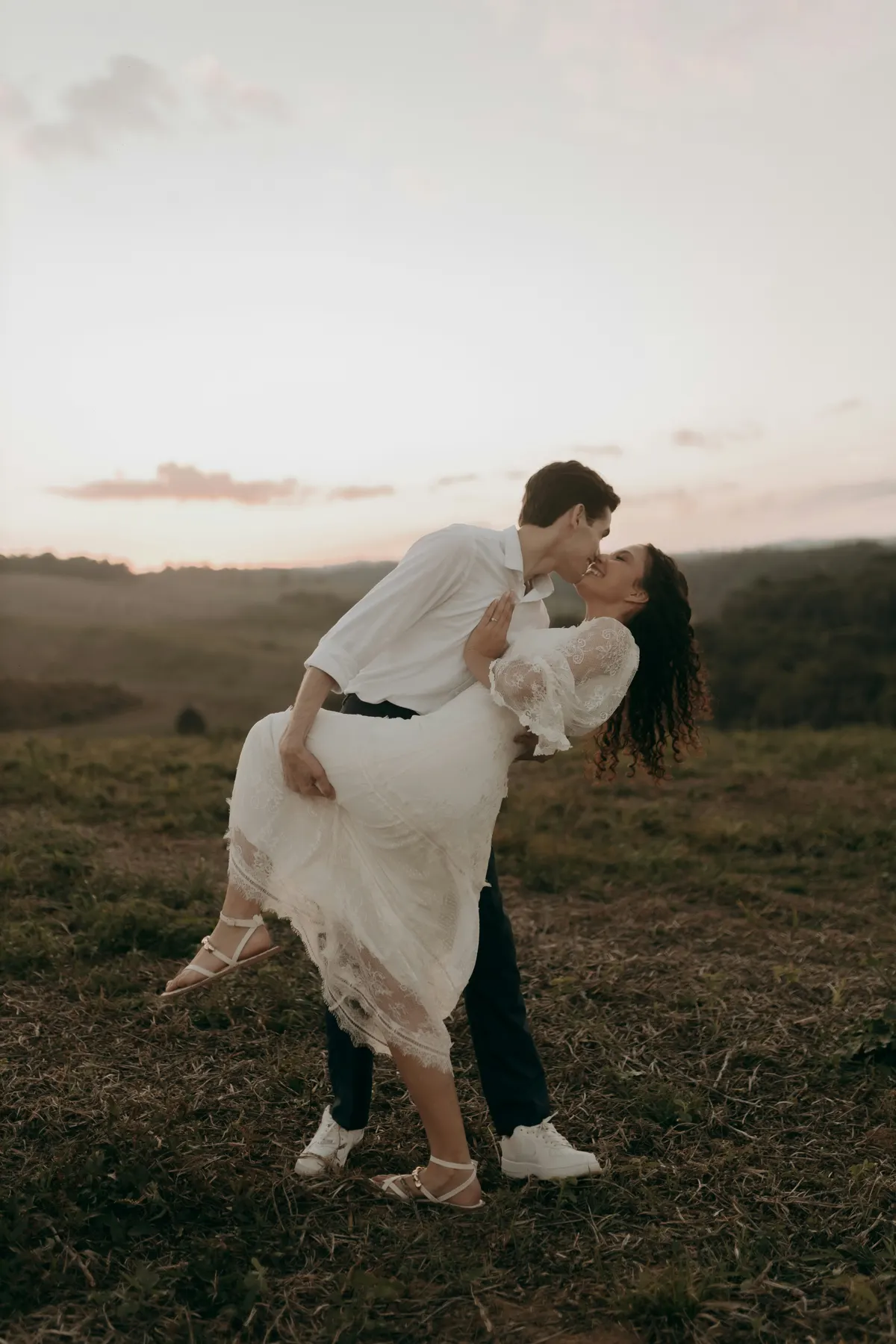 A kiss on the hill in the evening light