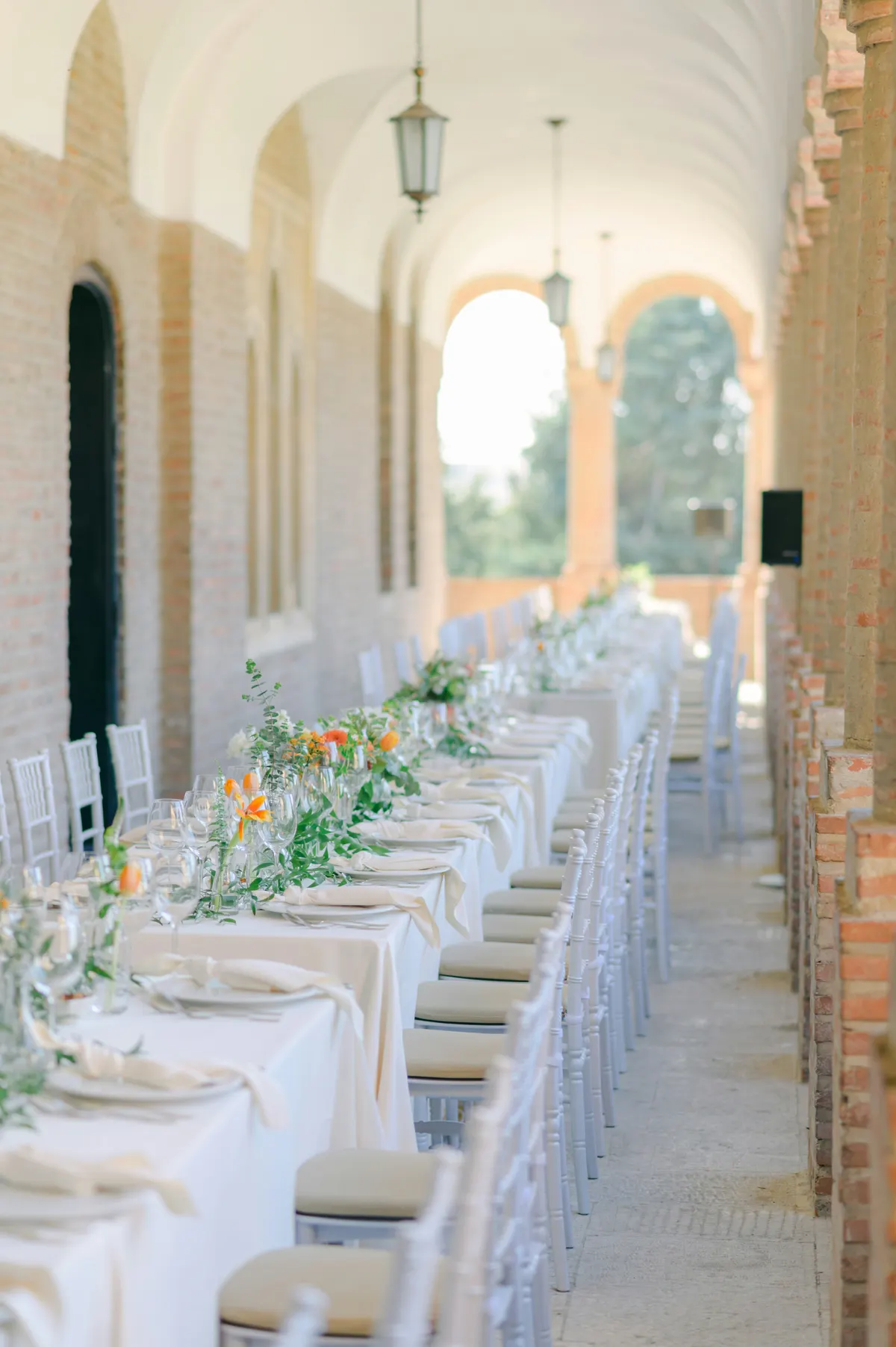 A long festive table with flowers